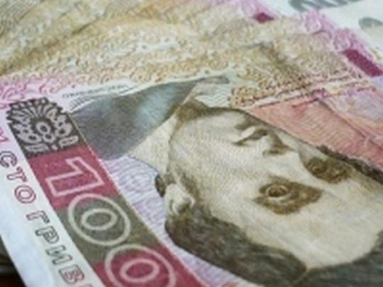 Нацбанк еще на 20 копеек ослабил курс гривни